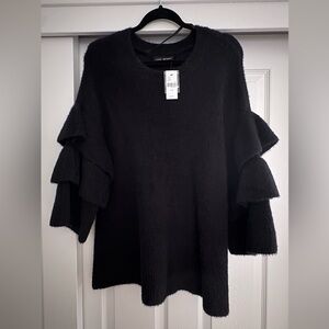Sweater weather! Brand new with tag. Tiered 3/4 bell sleeves.